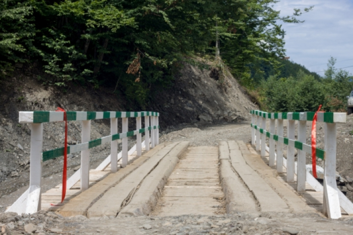 Інвестори міні-ГЕС відремонтували зруйнований паводком міст