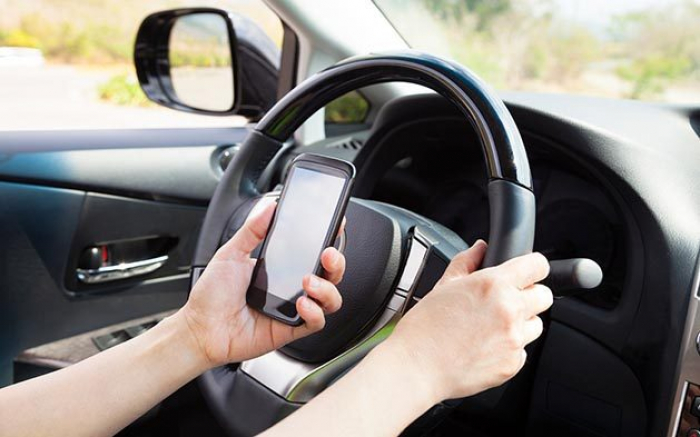 На Закарпатті оштрафували майже 500 водіїв-порушників з телефонами за кермом